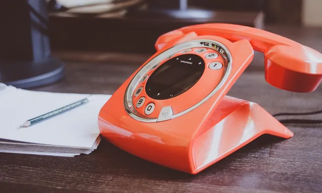 phone, desk, orange, workplace, block, pencil, office, vintage, wood, listener, note, dial, keys, phone, phone, phone, phone, desk, office, note, note, note, note, note. A small business CRM strategy for 2027, defined around the work
